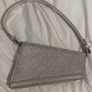 Madison West Silver Clutch